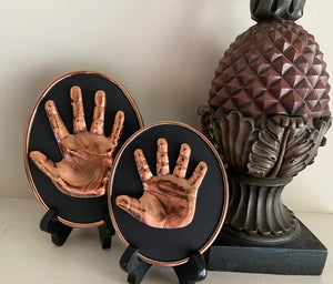 PERSONALIZED BRONZE HANDPRINT AND/OR FOOTPRINT ON  BLACK OVAL FOR BABIES