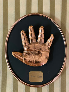 PERSONALIZED BRONZE HANDPRINT AND/OR FOOTPRINT ON  BLACK OVAL FOR BABIES